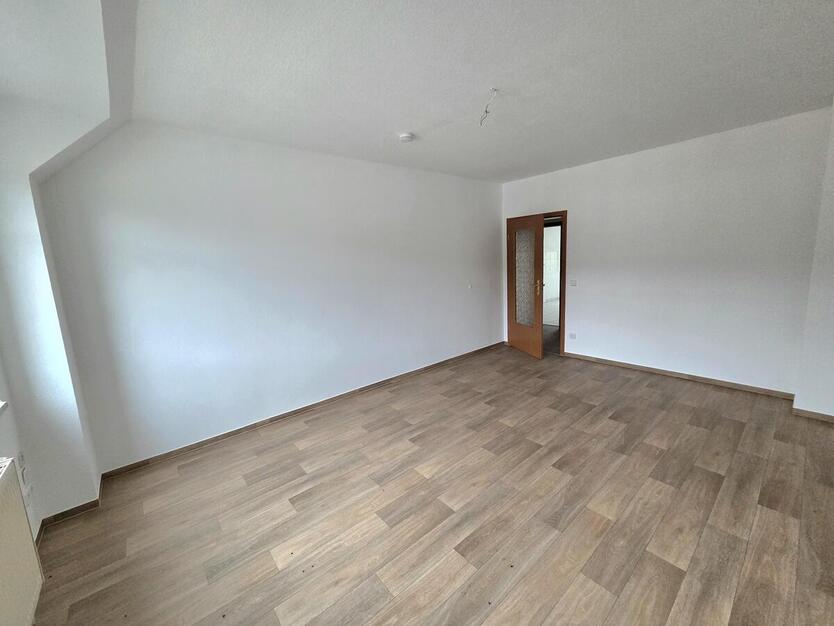 Stadtleben mit Weitblick: Moderne Dachgeschosswohnung mit Balkon und Einbauküche! 2 zimmer