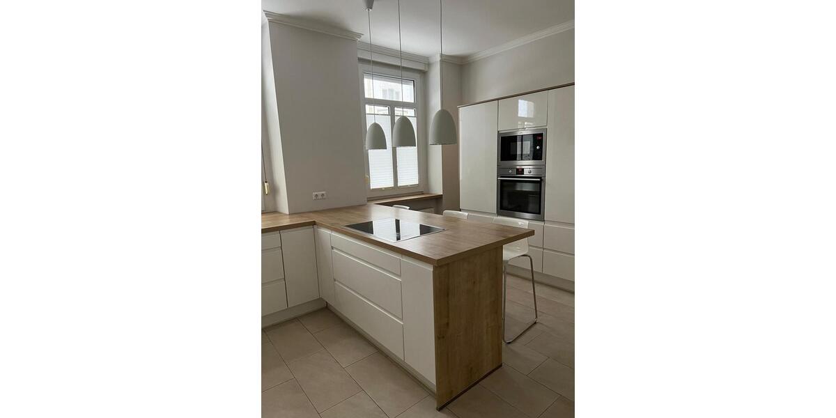 Hauscharakter Charmante 5,5-Zimmer-Altbauwohnung mit Einbauküche und großem Garten 5.5 zimmer