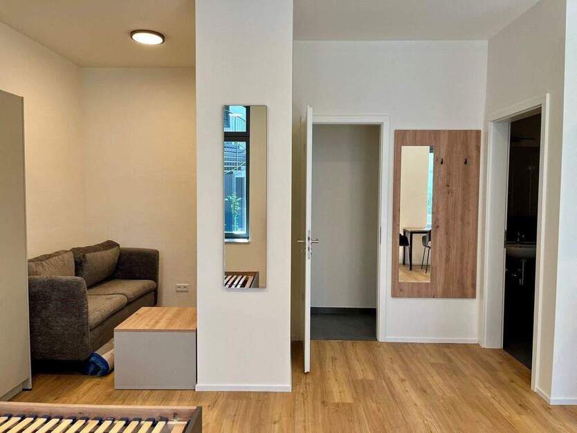 Loftige, möblierte 1-Zimmer-Wohnung mit großer Terrasse zum Erstbezug!