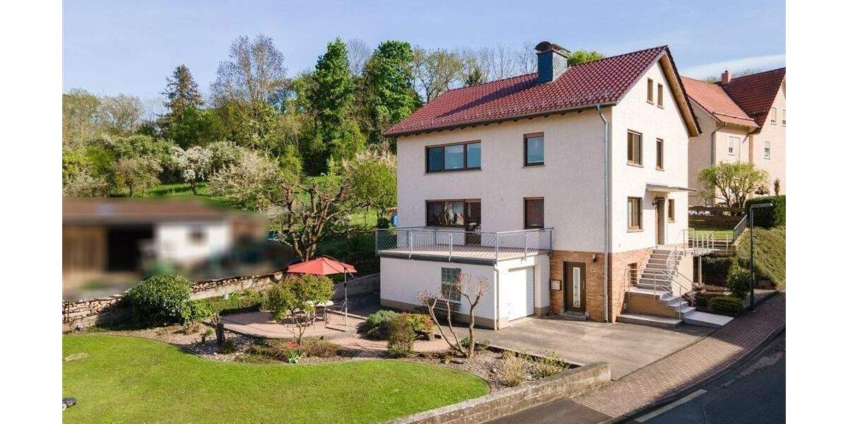 Ein- bis Zweifamilienhaus in Bestzustand: Geräumiges Wohnhaus mit Garage, Garten, Terrasse und gemütlicher Kellerbar 8 zimmer