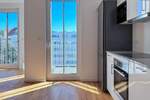Schlau und effizient geschnittene Wohnung - Bodentiefe Fenster, viel Licht und mitten in der Stadt 2 zimmer