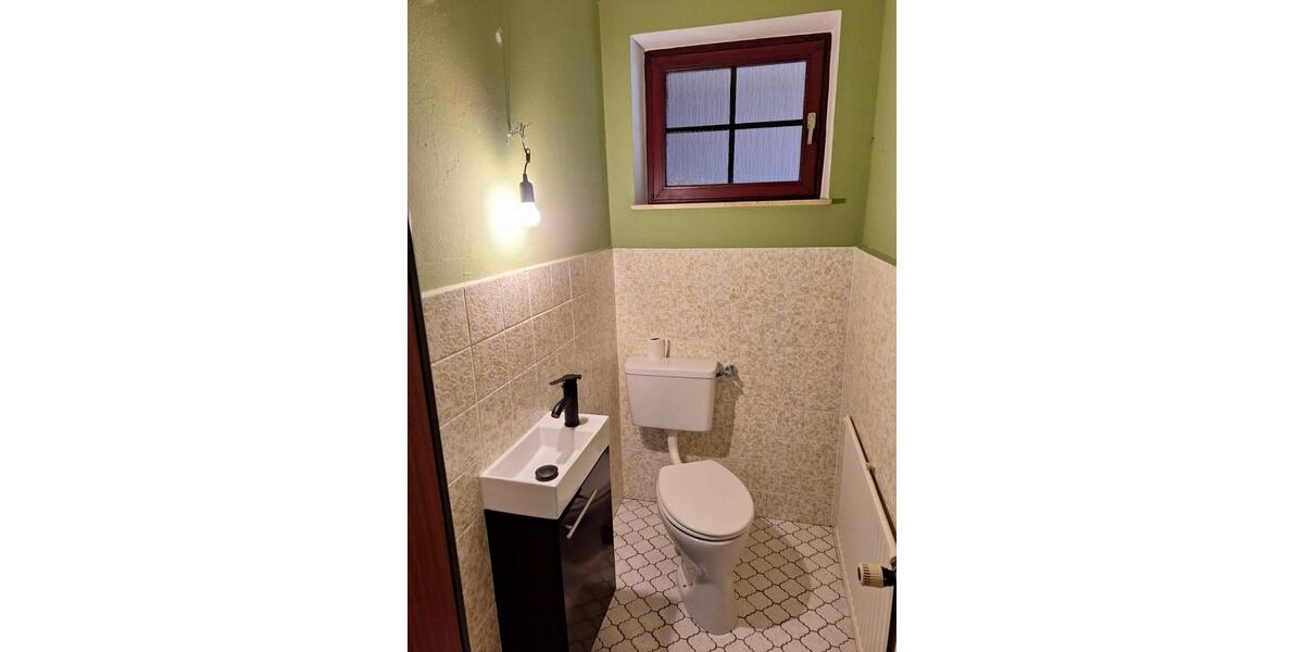 Erdgeschosswohnung mit Keller, Terrasse, Garage und Garten 3 zimmer