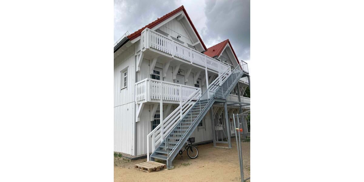 wunderschöne Dachgeschosswohnung mit zwei Balkonen im Holzneubau 3 zimmer