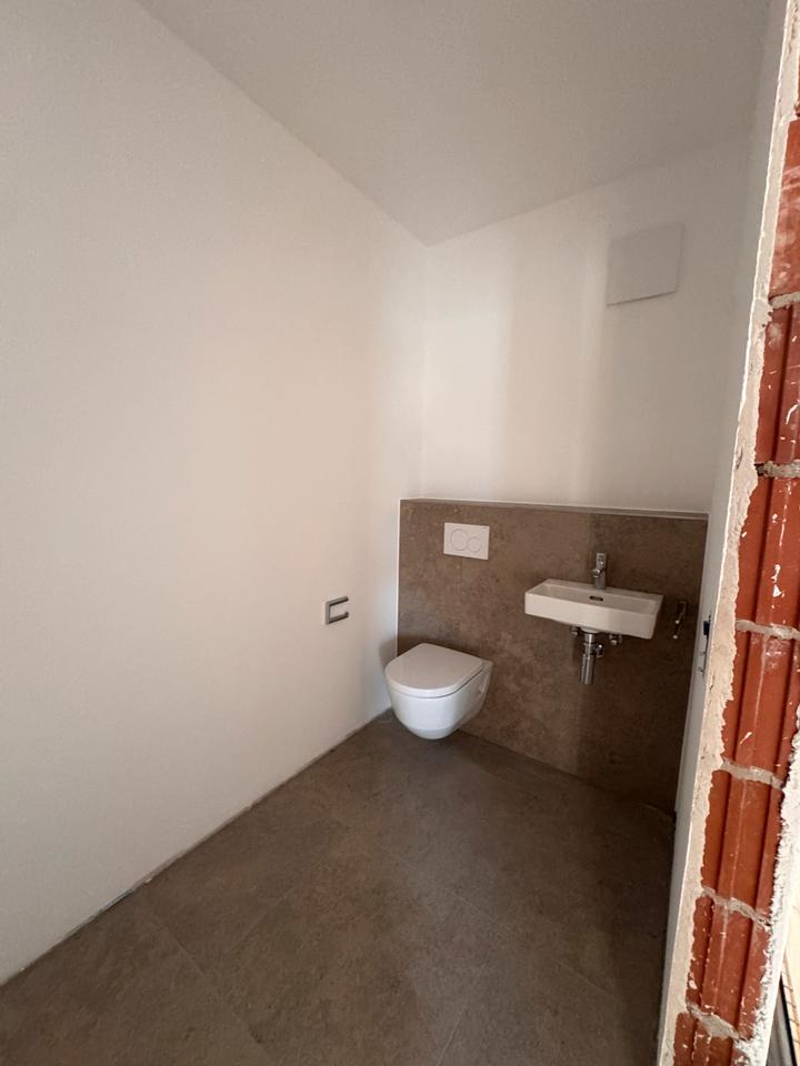 Erstbezug mit Balkon: Schöne, helle 4-Zimmer-Wohnung