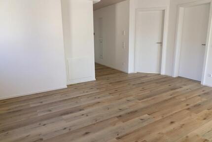 Lichtdurchflutete Maisonette-Wohnung mit zwei Balkonen in Mehrstetten - Erstbezug!