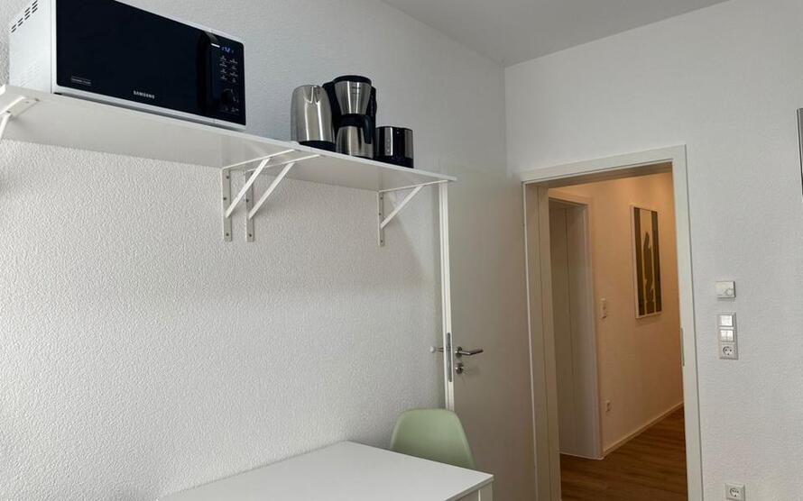 Gästezimmer mit TV, Internet, 2x EtagenduscheWC, Gästeküche, Waschmaschine und Trockner zimmer