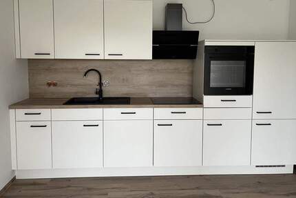 Rollstuhlgerechte Wohnung mit Fußbodenheizung, edlem Bad, moderner EBK, Terrasse! 2 zimmer