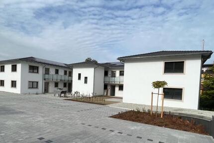 Neuwertige 3-Zimmer-Erdgeschosswohnung - inkl. moderne Einbauküche, Tiefgaragenstellplatz & Kellerabteil 3 zimmer